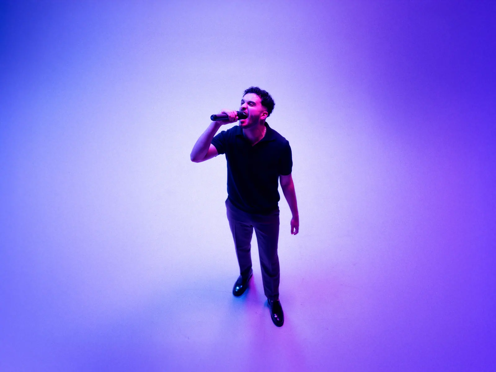 Hamoodi performing in the studio, photograph 1